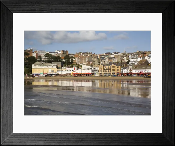Framed Print : South Sands in South Bay at low tide with seafront buildings reflected in wet sand on beach Framed Print : South Sands in South Bay at low tide with seafront buildings reflected in wet sand on beach