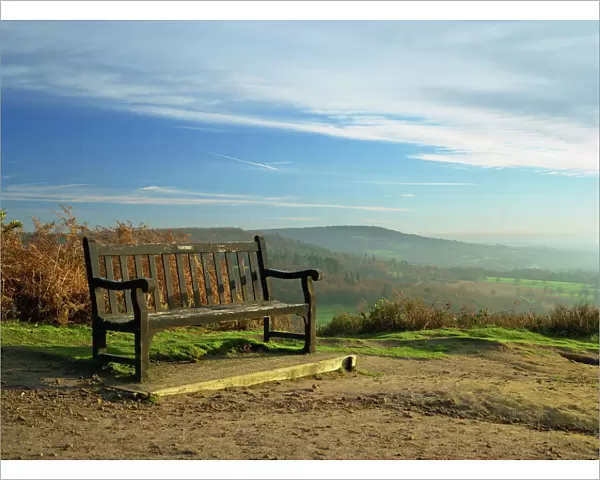 Bench on Pitch Hill, with view along the Greensand Ridge to Holmbury Hill and Leith Hill