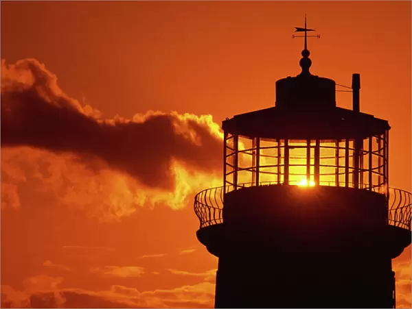 Sun shining through lantern room of Belle Tout, disused lighthouse, Beachy Head
