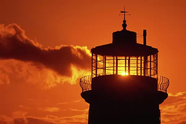 Sun shining through lantern room of Belle Tout, disused lighthouse, Beachy Head