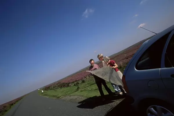 Motorists looking at the map, North Yorkshire Moors, Yorkshire, England