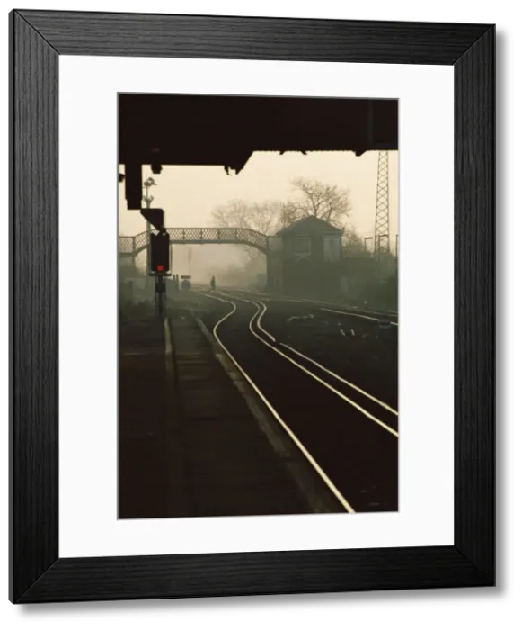 Framed Print : Railway lines in the early morning, Havant Railway Station, Havant, Hampshire Framed Print : Railway lines in the early morning, Havant Railway Station, Havant, Hampshire
