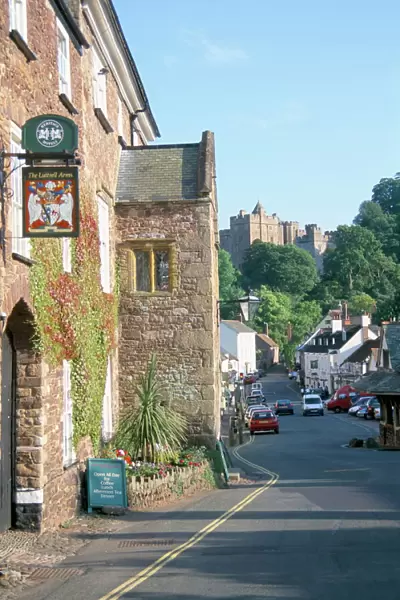 Luttrell Arms Hotel and Dunster Castle beyond, Dunster, Somerset, England