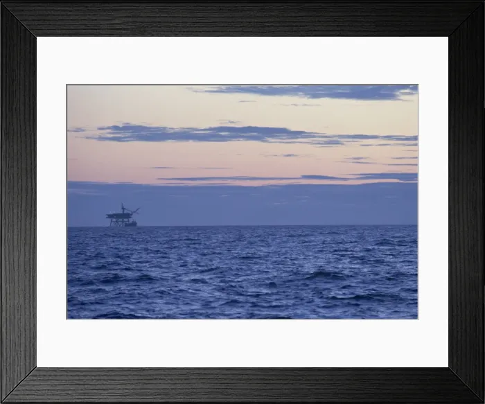 Framed Print : Gas platform silhouetted on horizon at dusk, Morecambe Bay Gas Field, Lancashire Framed Print : Gas platform silhouetted on horizon at dusk, Morecambe Bay Gas Field, Lancashire