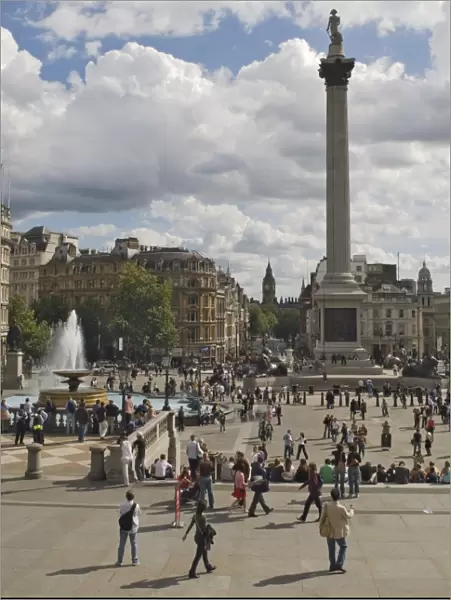 Nelsons Column in Trafalgar Square, with Big Ben in distance, London, England