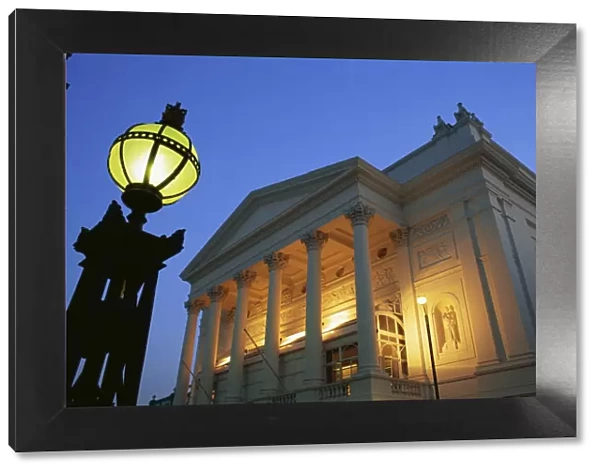 The Royal Opera House illuminated at dusk, Covent Garden, London, England