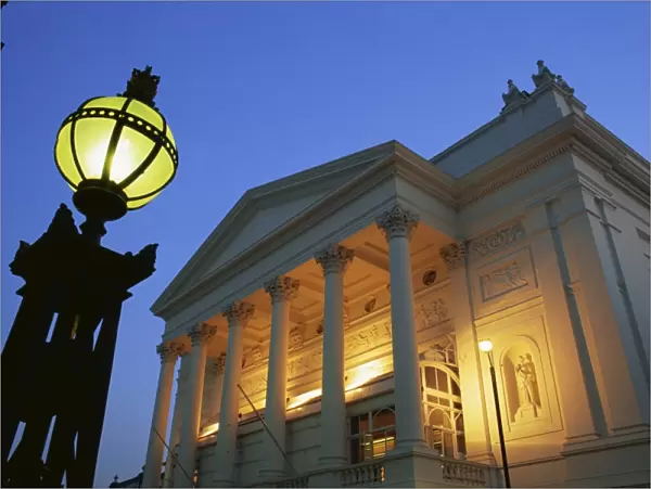 The Royal Opera House illuminated at dusk, Covent Garden, London, England