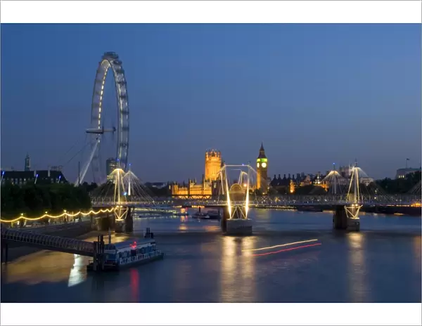 Houses of Parliament and London Eye at dusk, London, England, United Kingdom, Europe