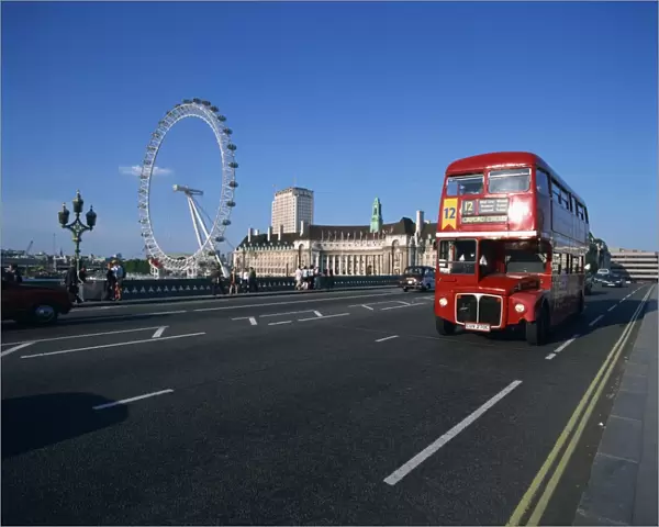 Old Routemaster bus before they were withdrawn, on Wesminster Bridge with London Eye in background