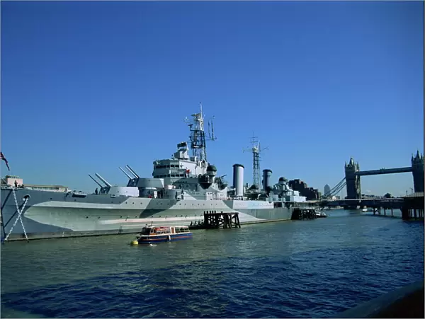 HMS Belfast moored near Tower Bridge on the Thames, London, England, United Kingdom