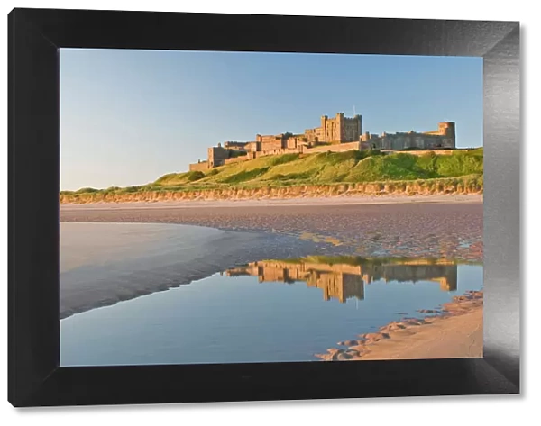 Morning light on the beach at Bamburgh Castle, Northumberland, England