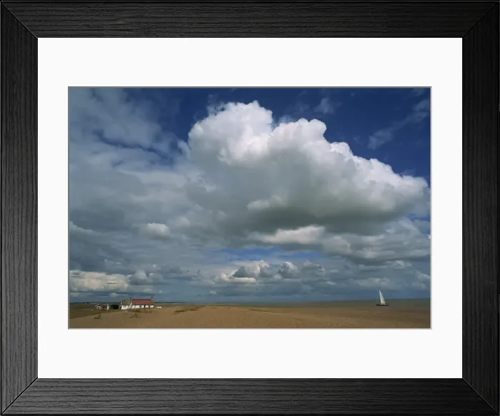 Framed Print : White clouds in a blue sky at Shingle Street near Felixstowe, Suffolk, England Framed Print : White clouds in a blue sky at Shingle Street near Felixstowe, Suffolk, England
