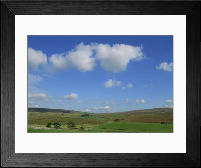 Framed Print : White clouds and blue skies over dales landscape near Ribble Head, North Yorkshire Framed Print : White clouds and blue skies over dales landscape near Ribble Head, North Yorkshire