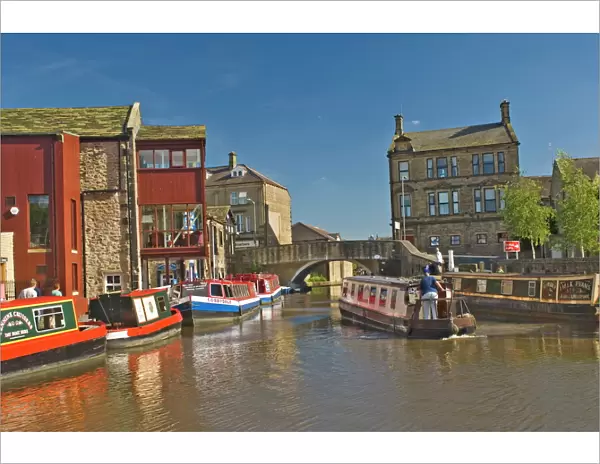 Narrow boats on the Liverpool Leeds canal, in the basin at Skipton, Yorkshire Dales National Park