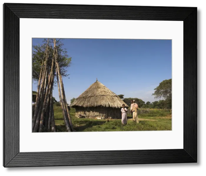 Framed Print : Oromo family outside their house, Oromo village near Langano lake, Rift Valley Framed Print : Oromo family outside their house, Oromo village near Langano lake, Rift Valley