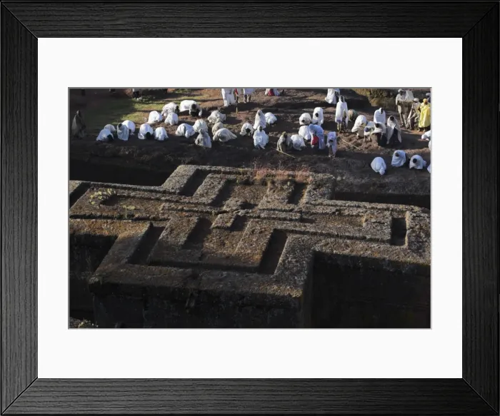 Framed Print : Pilgrims wearing traditonal gabi (white shawl) at festival at rock-hewn monolithic church of Bet Giyorgis (St. George s), roof shaped like a Greek cross, Lalibela, UNESCO World Heritage Site Framed Print : Pilgrims wearing traditonal gabi (white shawl) at festival at rock-hewn monolithic church of Bet Giyorgis (St. George s), roof shaped like a Greek cross, Lalibela, UNESCO World Heritage Site