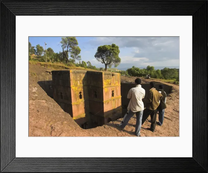 Framed Print : Men looking at rock-hewn monolithic church of Bet Giyorgis (St. George s) Framed Print : Men looking at rock-hewn monolithic church of Bet Giyorgis (St. George s)