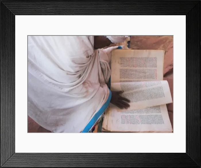 Framed Print : Pilgrim reading religious book on church steps, Lalibela, Ethiopia, Africa Framed Print : Pilgrim reading religious book on church steps, Lalibela, Ethiopia, Africa