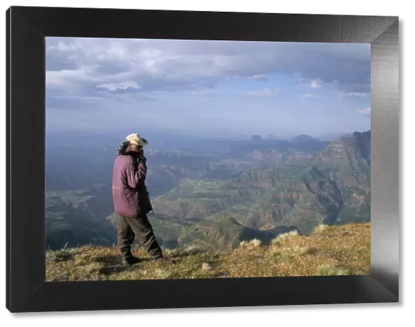 Ranger and mountain scenery, Simien Mountains National Park, UNESCO World Heritage Site