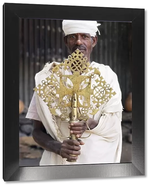 Portrait of a man holding a treasure from the Narga Selassie Christian church