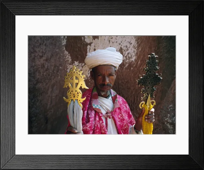 Framed Print : Portrait of a man holding Christian symbols, Gabriel and Raphael, Bieta Mercurios