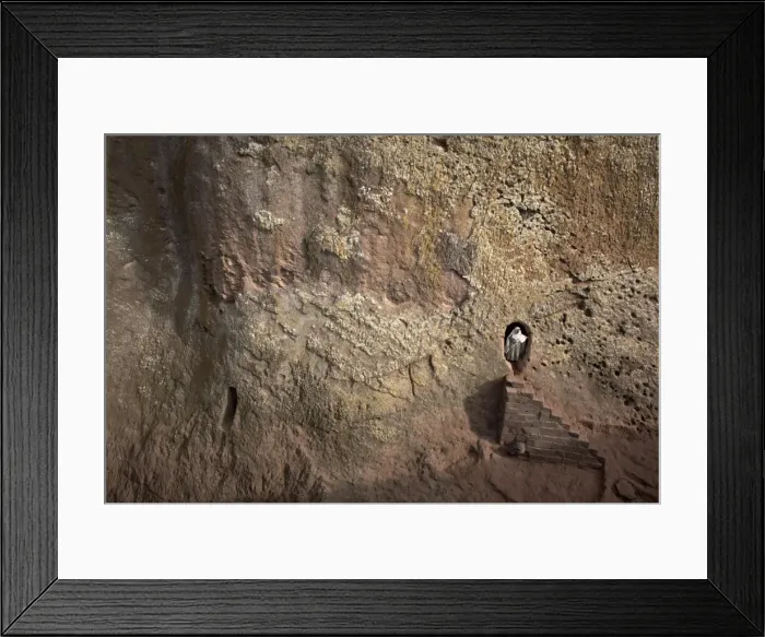 Framed Print : A woman emerges from a tunnel leading to the rock-hewn church of Bet Amanuel Framed Print : A woman emerges from a tunnel leading to the rock-hewn church of Bet Amanuel
