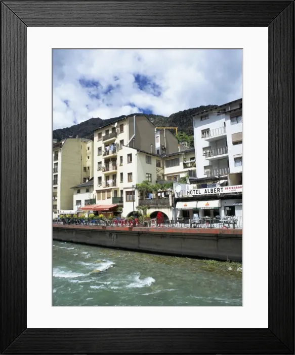 Framed Print : Street cafes on the bank of Riu Valira which runs through the capital city Framed Print : Street cafes on the bank of Riu Valira which runs through the capital city