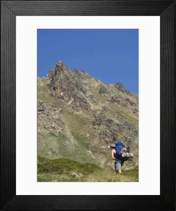 Framed Print : Hiker on climbing trail in hiking area of Pic de Coma Pedrosa, Andorras highest mountain Framed Print : Hiker on climbing trail in hiking area of Pic de Coma Pedrosa, Andorras highest mountain