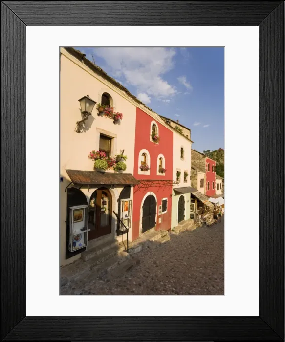 Framed Print : Cobbled street lined with colourful houses known as Kujundziluk, one of the oldest streets in Mostar leading to the Old Bridge, Old Town, UNESCO World Heritage Site, Mostar, Herzegovina, Bosnia Framed Print : Cobbled street lined with colourful houses known as Kujundziluk, one of the oldest streets in Mostar leading to the Old Bridge, Old Town, UNESCO World Heritage Site, Mostar, Herzegovina, Bosnia