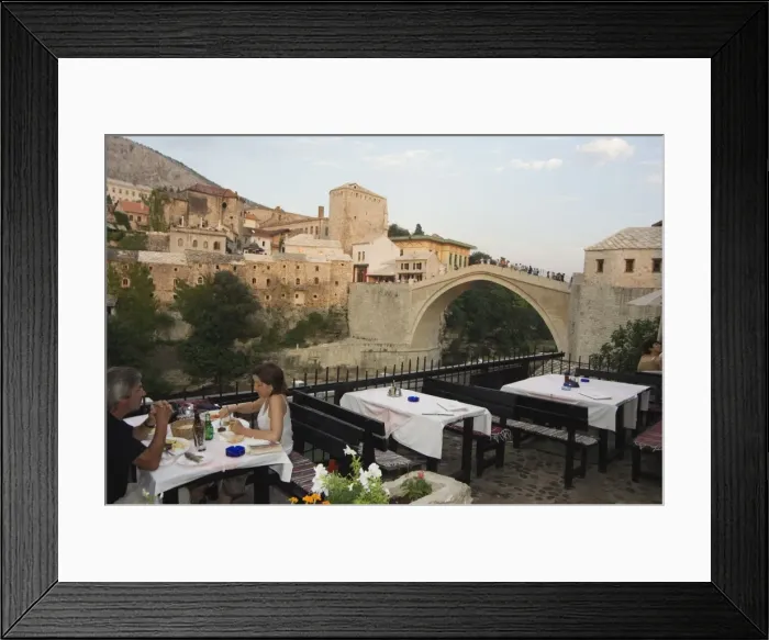 Framed Print : Restaurant overlooking the Stari Most Peace Bridge on Neretva River, Mostar Framed Print : Restaurant overlooking the Stari Most Peace Bridge on Neretva River, Mostar