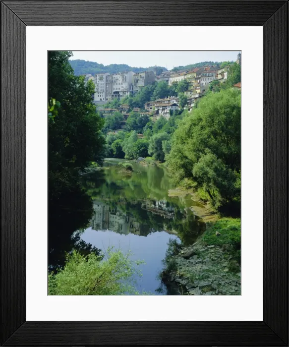 Framed Print : The Yantra River and Veliko Turnovo City behind on side of hill, Bulgaria Framed Print : The Yantra River and Veliko Turnovo City behind on side of hill, Bulgaria