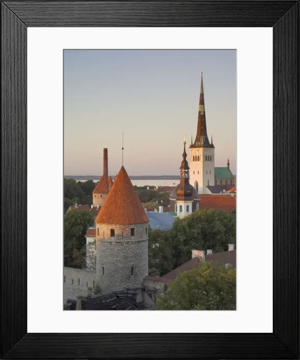 Framed Print : Medieval town walls and spire of St. Olavs church at dusk, Tallinn Framed Print : Medieval town walls and spire of St. Olavs church at dusk, Tallinn