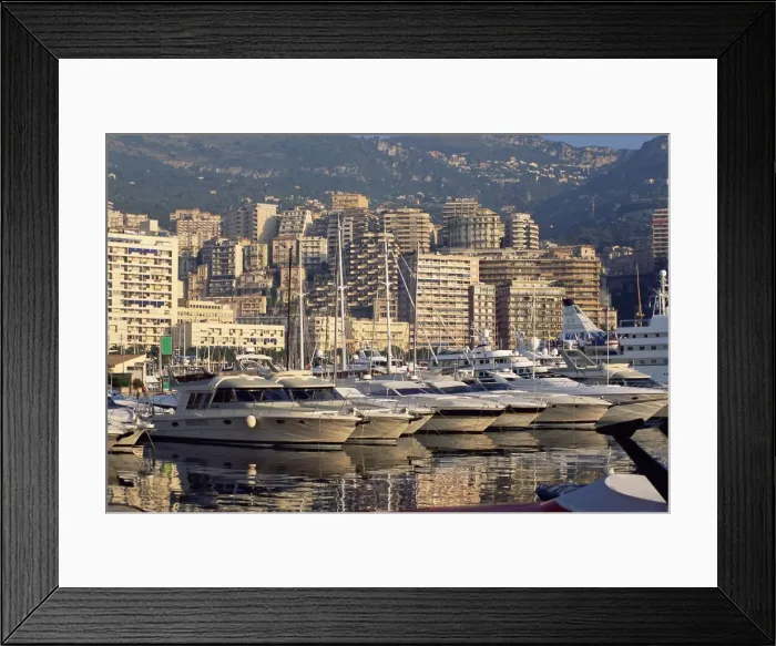 Framed Print : Motor cruisers at anchor and highrise buildings above the harbour, La Condamine Framed Print : Motor cruisers at anchor and highrise buildings above the harbour, La Condamine