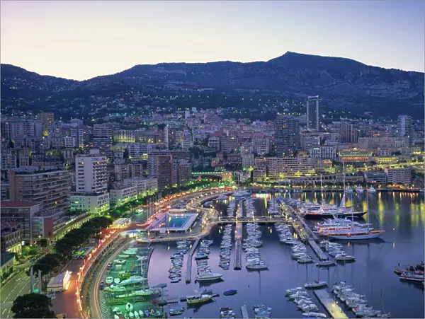 The marina, waterfront and town of Monte Carlo in the evening, Monaco, Mediterranean