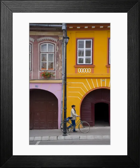 Framed Print : Detail of colourfully painted houses in medieval citadel town, Sighisoara Framed Print : Detail of colourfully painted houses in medieval citadel town, Sighisoara