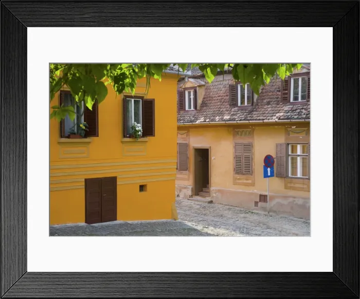 Framed Print : Cobbled streets lined with 16th century burgher houses in the medieval citadel Framed Print : Cobbled streets lined with 16th century burgher houses in the medieval citadel