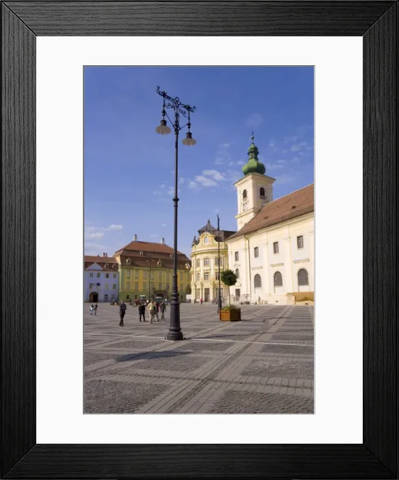 Framed Print : Colourfully painted houses and buildings surrounding the main old town square Framed Print : Colourfully painted houses and buildings surrounding the main old town square