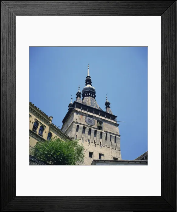 Framed Print : The 14th century Clock Tower with 1648 clock in the medieval citadel at Sighisoara Framed Print : The 14th century Clock Tower with 1648 clock in the medieval citadel at Sighisoara