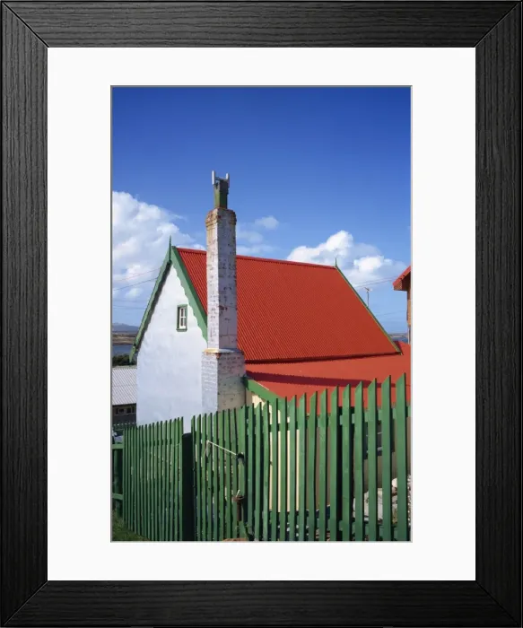 Framed Print : A private house with red corrugated roof and green fence in Stanley, capital of the Falkland Islands Framed Print : A private house with red corrugated roof and green fence in Stanley, capital of the Falkland Islands