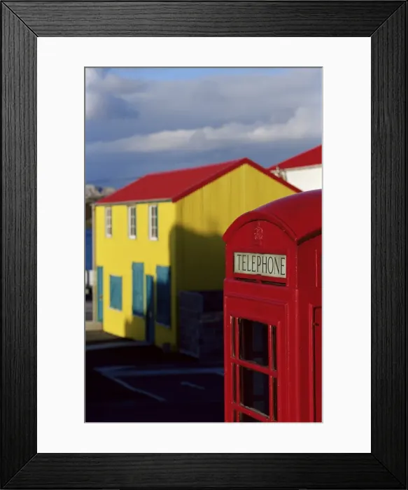 Framed Print : British red telephone box and colourful traditional house, Stanley, East Falkland Framed Print : British red telephone box and colourful traditional house, Stanley, East Falkland