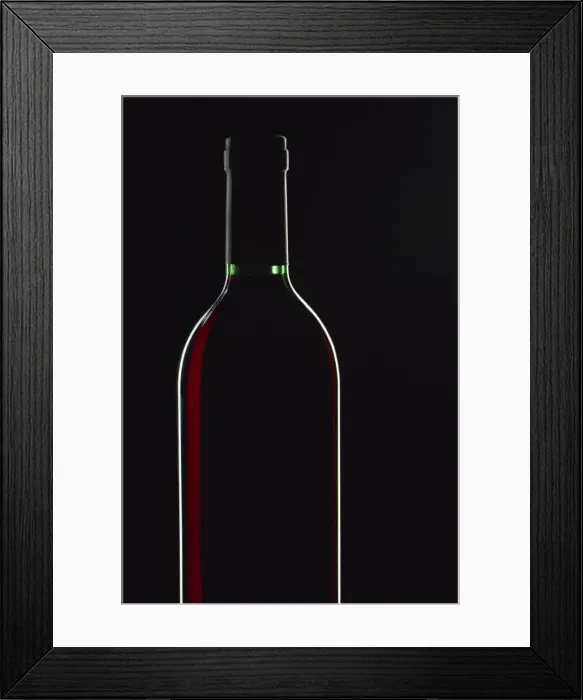 Framed Print : Backlit shot of a bottle of red wine Framed Print : Backlit shot of a bottle of red wine