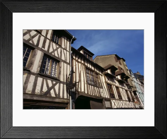 Framed Print : Aitre Saint Maclou, a 16th century charnel house, typical of the half timbered houses in the city of Rouen, Haute Normandie Framed Print : Aitre Saint Maclou, a 16th century charnel house, typical of the half timbered houses in the city of Rouen, Haute Normandie