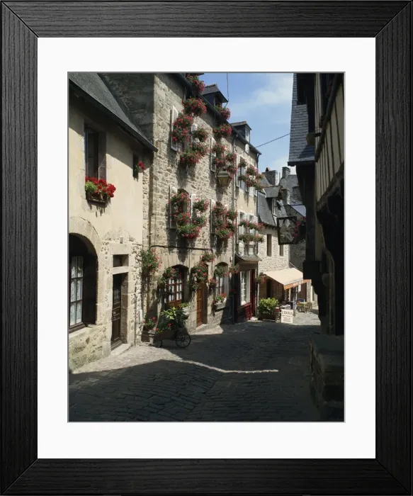 Framed Print : Pots and windowboxes of geraniums on houses on the Rue de Jerzual in Dinan Framed Print : Pots and windowboxes of geraniums on houses on the Rue de Jerzual in Dinan