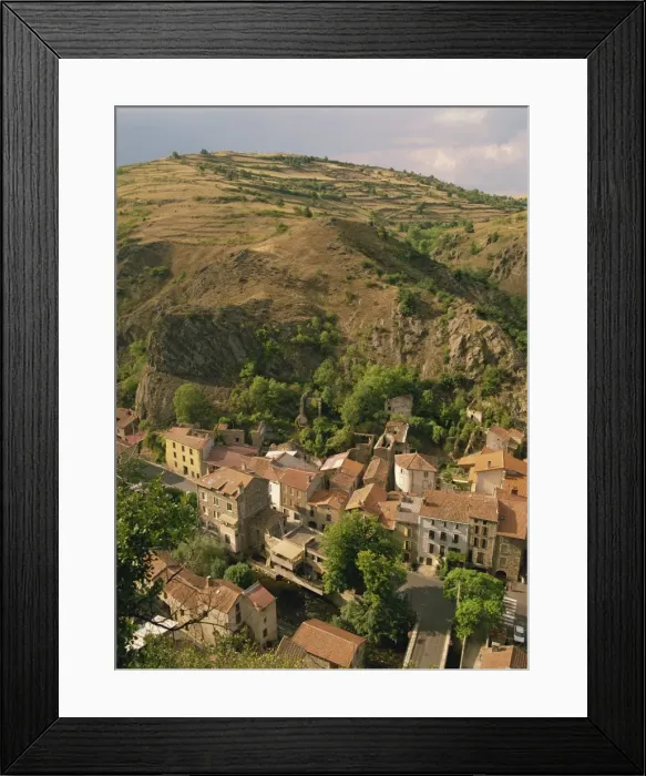 Framed Print : Houses of the village of St. Floret in the Couze de Pavin Valley, with hill behind Framed Print : Houses of the village of St. Floret in the Couze de Pavin Valley, with hill behind