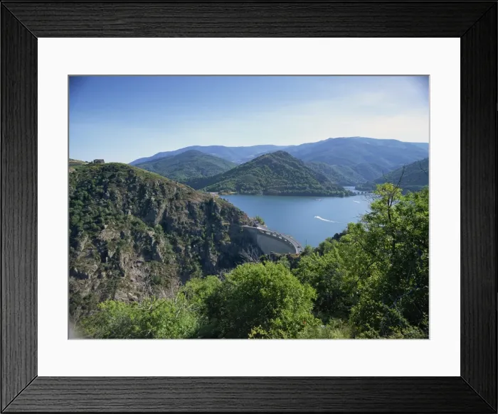 Framed Print : The Cevennes Dam, with the Lac de Villefort and hills in the background Framed Print : The Cevennes Dam, with the Lac de Villefort and hills in the background