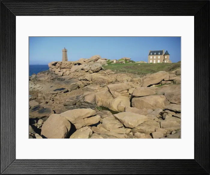Framed Print : Rocks on the coast and the lighthouse at Ploumanach, on the Cote de Granit Rose Framed Print : Rocks on the coast and the lighthouse at Ploumanach, on the Cote de Granit Rose