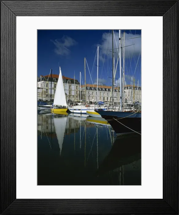 Framed Print : Reflections of boats in the marina with the naval storehouse, (Magasin aux Vivres) behind Framed Print : Reflections of boats in the marina with the naval storehouse, (Magasin aux Vivres) behind