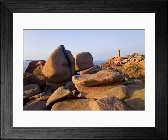 Framed Print : Sunset over rocks and lighthouse at Pars-Kamor, Ploumanach, Breton Corniche