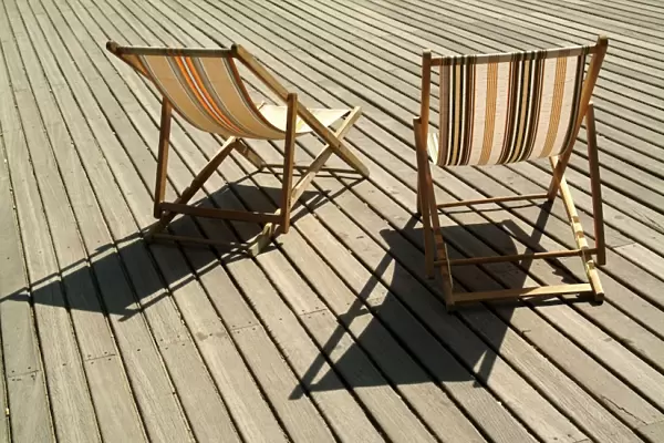 Deckchairs on the seafront boardwalk (la planche), Deauville, Cote Fleurie