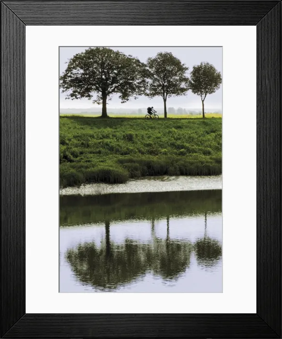 Framed Print : Cyclist on banks of River Somme, St. Valery sur Somme, Picardy, France, Europe Framed Print : Cyclist on banks of River Somme, St. Valery sur Somme, Picardy, France, Europe